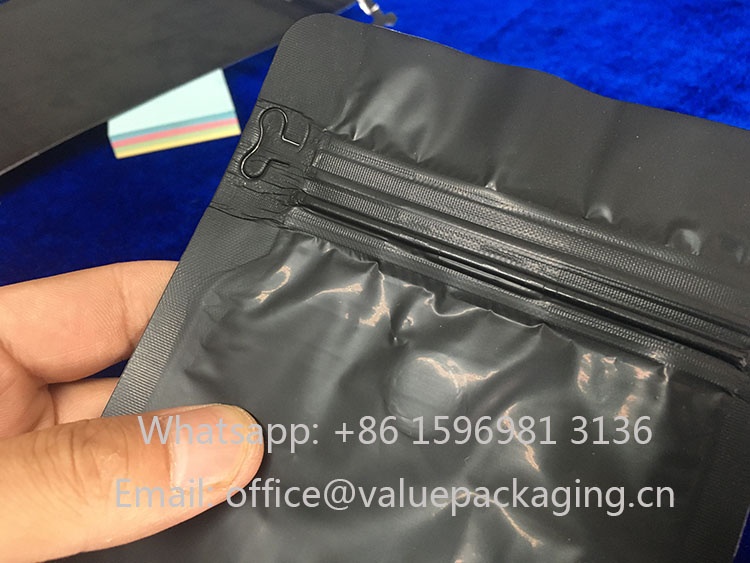 Ugly-appearance-for-tab-zipper-on-matte-black-coffee-package