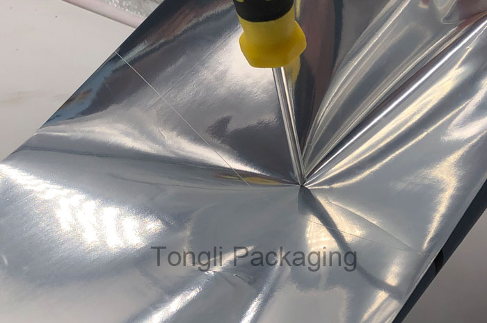 Anti-puncture Strength Test on PET/AL/LDPE Multilayer Laminate